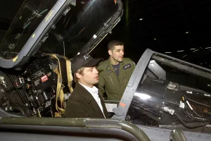 Actor Brad Pitt site in the cockpit of a Royal Air Force (RAF) GR3A Jaguar aircraft as RAF Flight Lieutenant, Rich Wells looks on, at Incirlik AB, Turkey. Brad Pitt and member of the Warner Brother's movie "Ocean's 11" crew visited with deployed military personnel during Operation NORTHERN WATCH. Photo: Staff Sgt. Diane Thomas