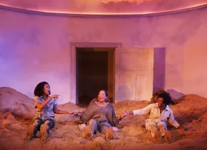Marinda Anderson, Rolonda Watts, Brittany Bellizeare in a scene from Sandblasted. Photo by Carol Rosegg