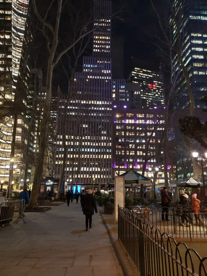 People strolling on a cold night at Bryant Park. Photo by Sora Vernikoff