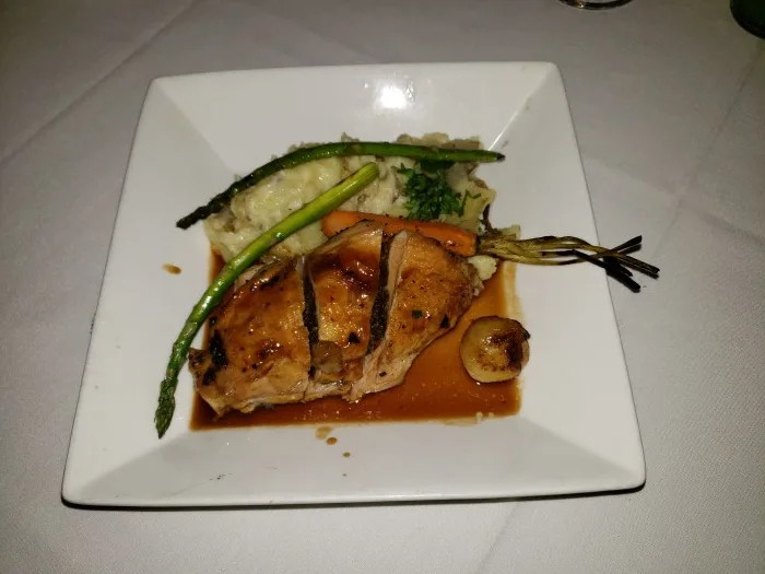 Organic Chicken stuffed with mushrooms with smashed potatoes, grilled asparagus and carrots at the Bryant Park Grill. Photo by Sora Vernikoff