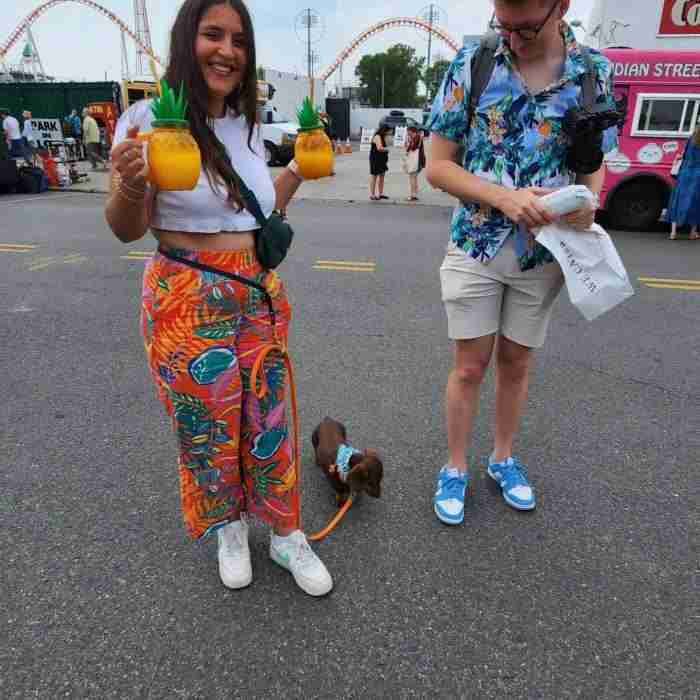 Visitors enjoying cool refreshments at the Coney Island Mermaid Parade. Photo by Sora Vernikoff