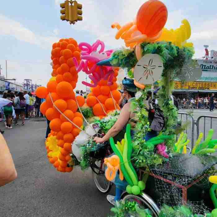 Vivid colors, bikes and balloons at the Coney Island Mermaid Parade. Photo by Sora Vernikoff
