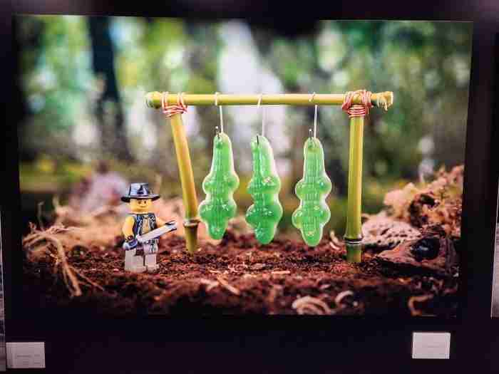 A picture containing screenshot, green, indoor, art Description automatically generated