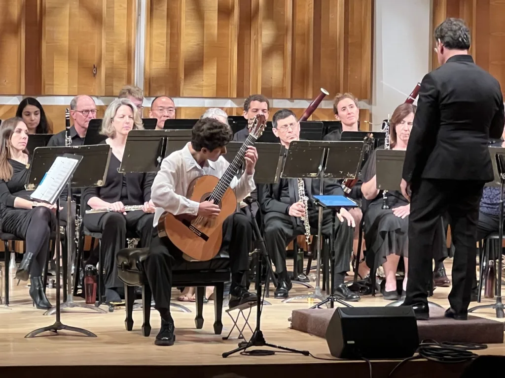 Guitarist Romero Biagni-Rosenbaum with David Bernard and the Park Avenue Chamber Symphony at Merkin Hall. Photo by Edward Kliszus