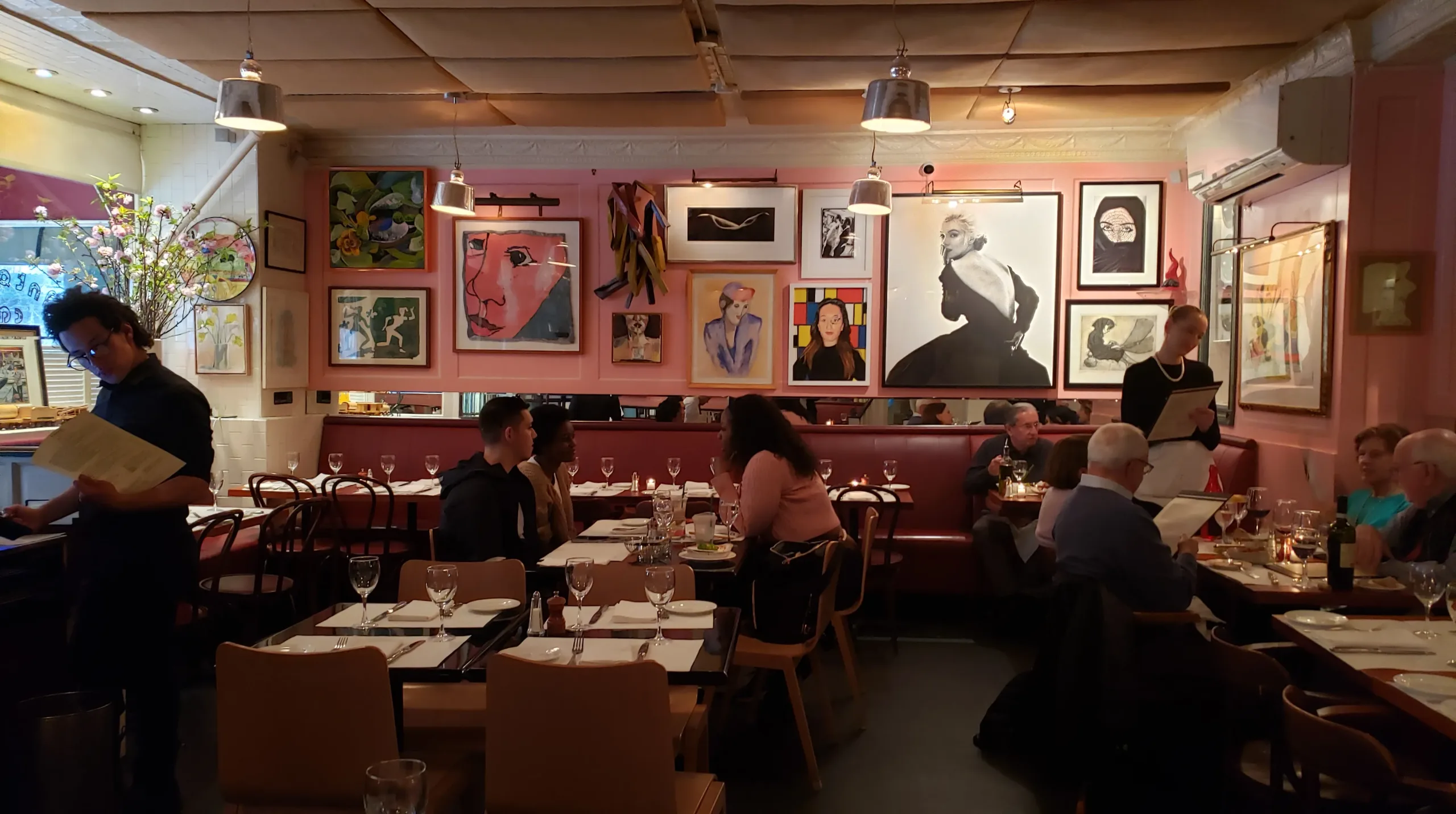 Dining area and wall art in Antonucci Cafe Photo by Sora Vernikoff