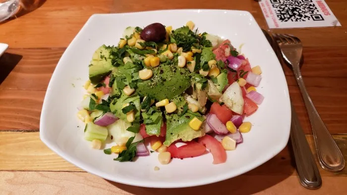 Avocado and tomato salad at Lokal Mediterranean Kitchen. Photo by Sora Vernikoff