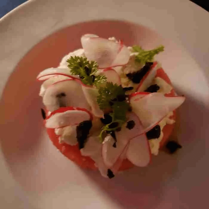 Chilled Watermelon with Valbreso Feta, Thassos Olives, and Pastéque Vinaigrette dressing at Cathédrale. Photo by Sora Vernikoff