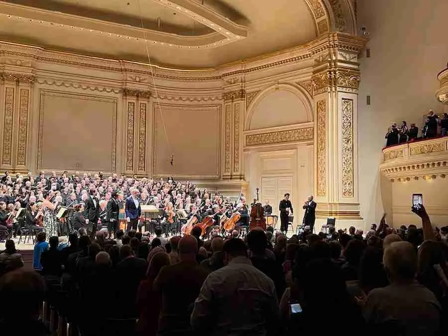 Kent Tritle and the Oratorio Society of New York at Carnegie Hall in an extended, well-earned standing ovation. Photo by Edward Kliszus
