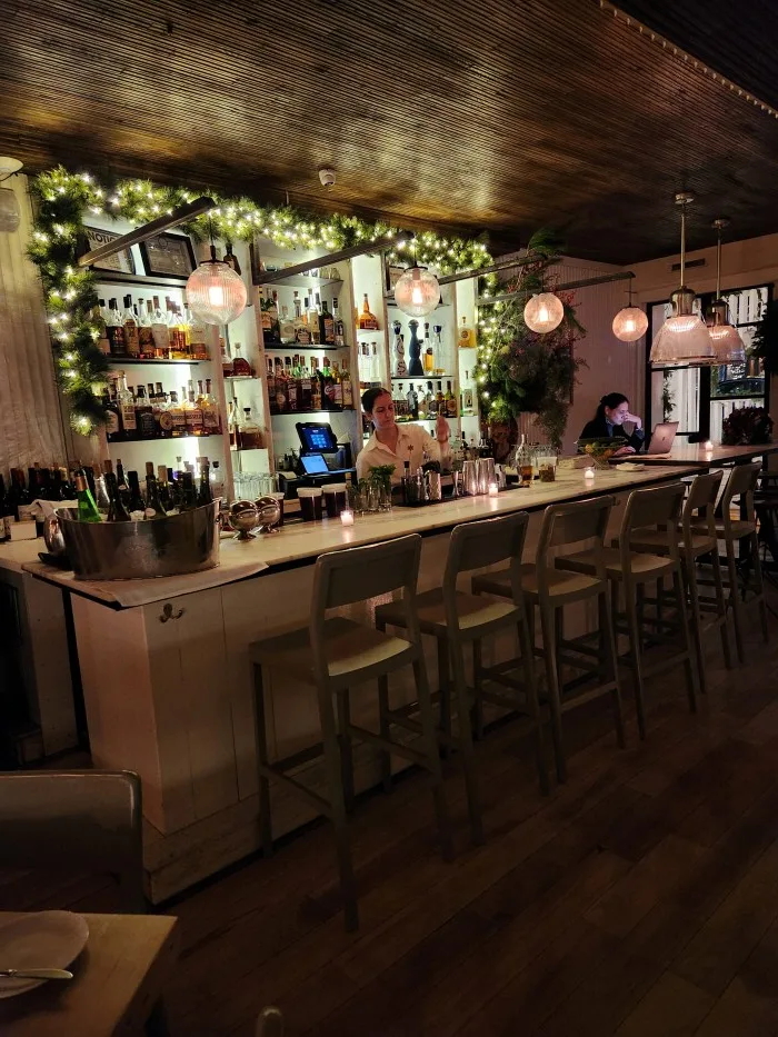 Bar seating at Amali Mediterranean Restaurant. Photo by Sora Vernikoff.
