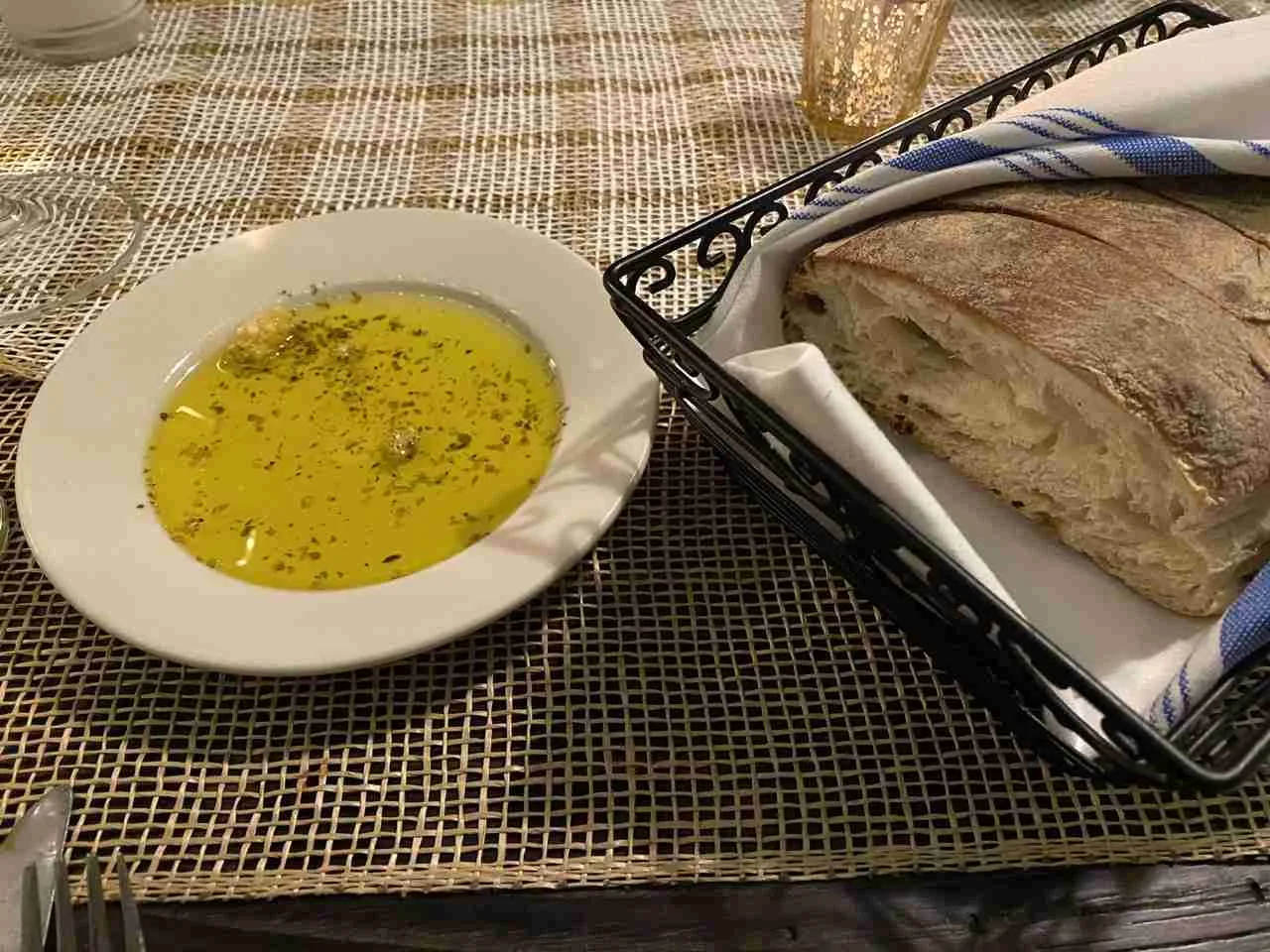Fresh crusty Italian bread with seasoned olive oil at Spano's. Photo by Valérie Blanchard