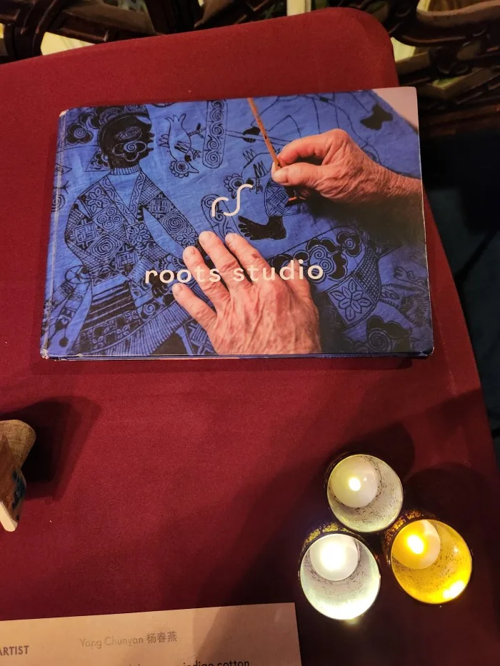 A book on a table Description automatically generated