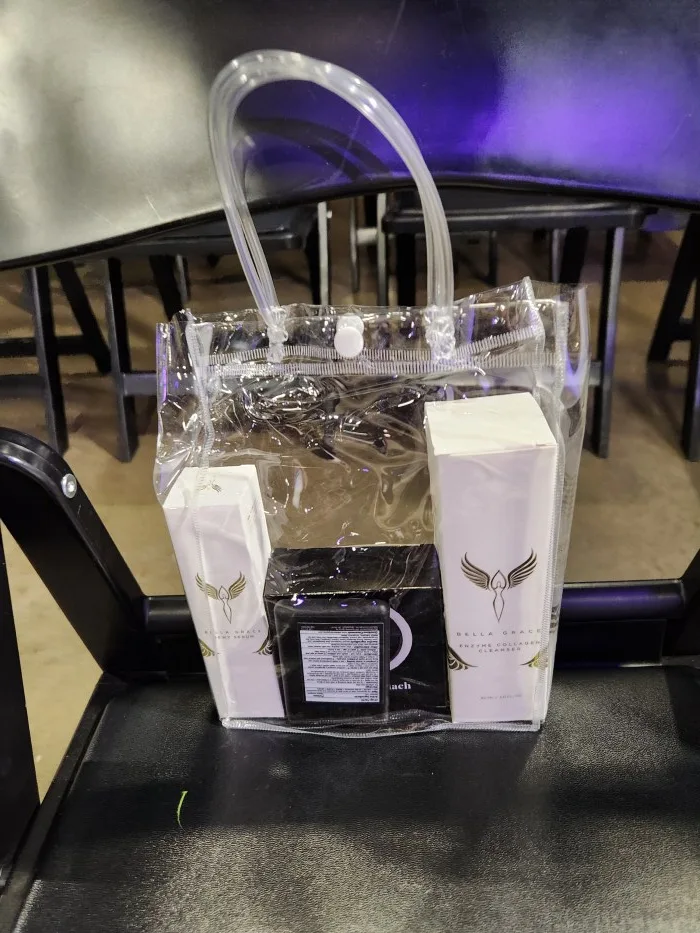 A plastic bag with a tube attached to it Description automatically generated