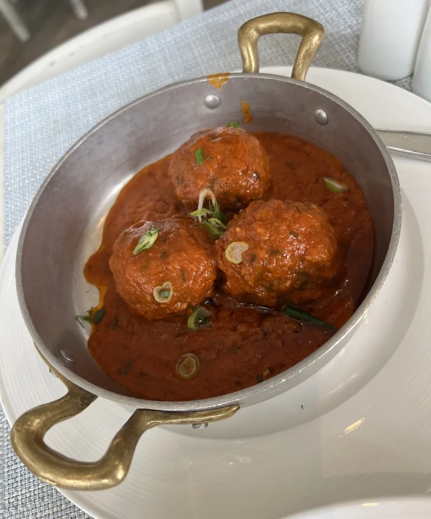 Keftedes, traditional Greek-style meatballs with tomato sauce at Ethos. Photo by Valérie Blanchard