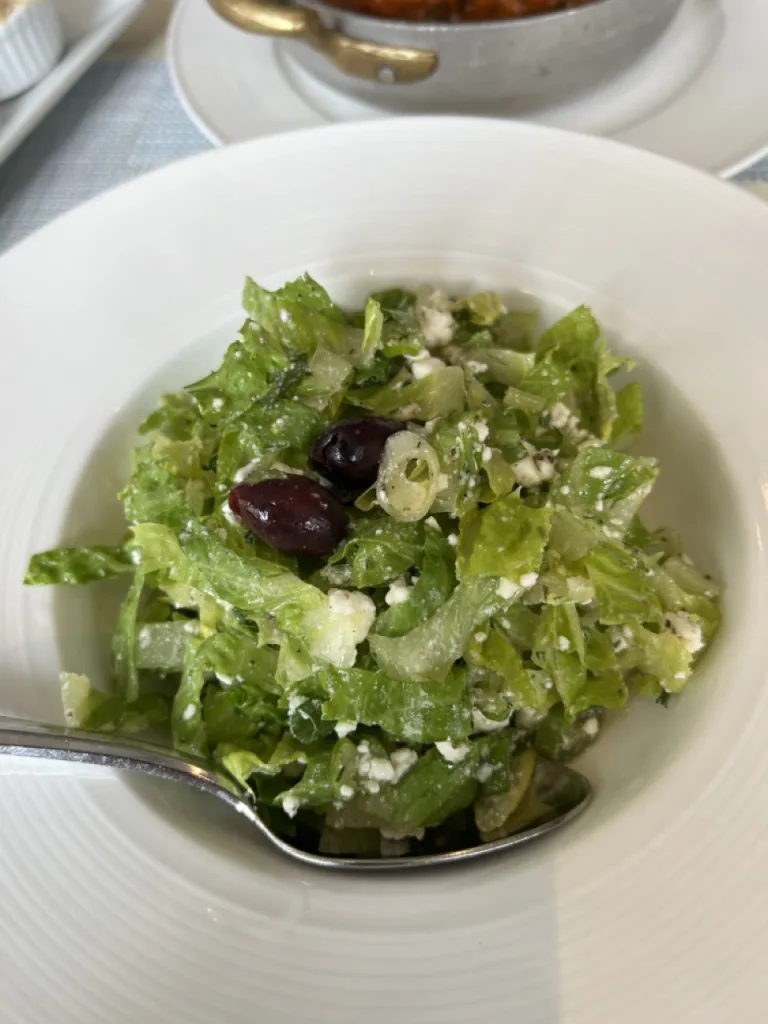 Marouli Salad with romaine hearts, fresh scallions, dill, and feta in a house dressing Photo by Valérie Blanchard