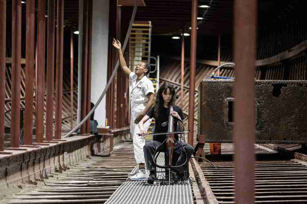 L-R: mayfield brooks and Dorothy Carlos in Whale Fall Abyss on the sailing ship Wavertree at the South Street Seaport Museum in Manhattan, NY. Courtesy LMCC.net