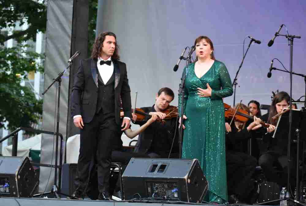 Tenor Victor Starsky and Soprano Irina Rindzuner performing Tu tu amore tu! from Manon Lescaut in A Spectacular Puccini Tribute: New York City Opera's Outdoor Concert at Bryant Park. Photo by Edward Kliszus