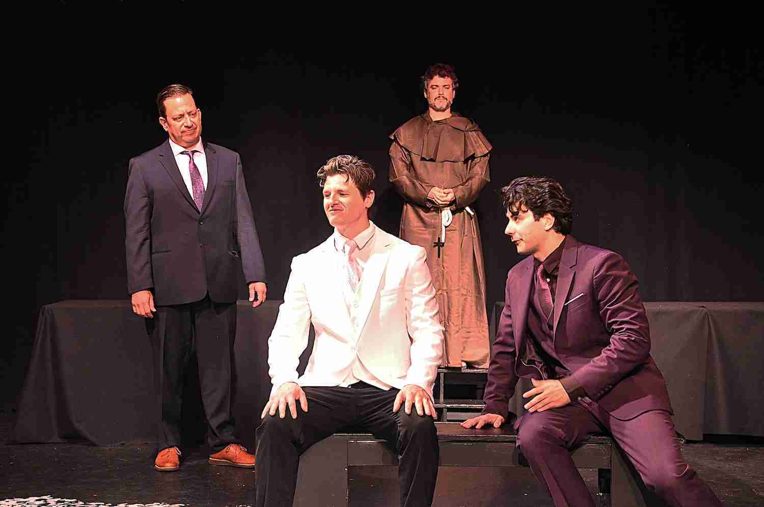 Jordan Bell as Secole Friar. Sitting - Dillon John Collins (Claudio) & Jake Minevich (Benedick). in a scene from Much Ado About Nothing at the Gene Frankel Theater. Photo by Rob Klein