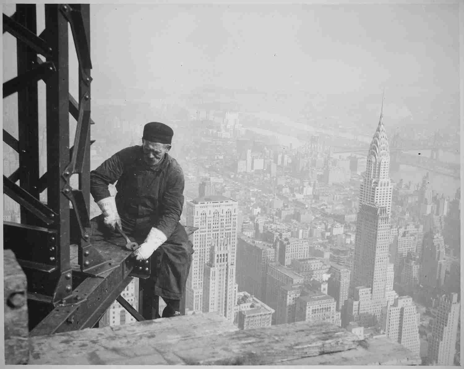 Photograph of a Workman on the Framework of the_Empire State Building. Photo by Lewis Hine. Public domain, via Wikimedia Commons
