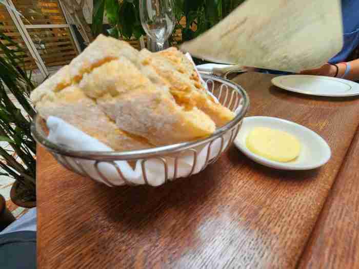 Fresh French bread and creamery butter at La Grande Boucherie on 145 W 53rd St, New York, NY 10019. Photo by Sora Vernikoff
