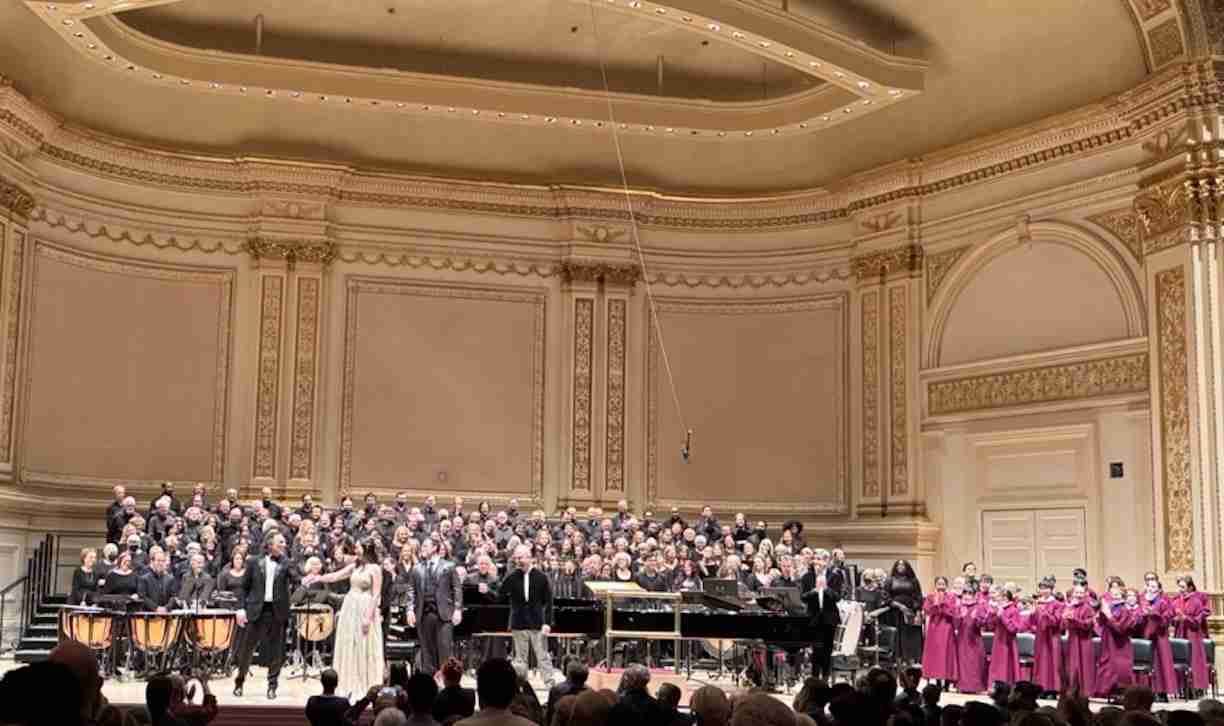 Oratorio Society of New York standing to extended ovations in Carnegie Hall. Photo by Edward Kliszus