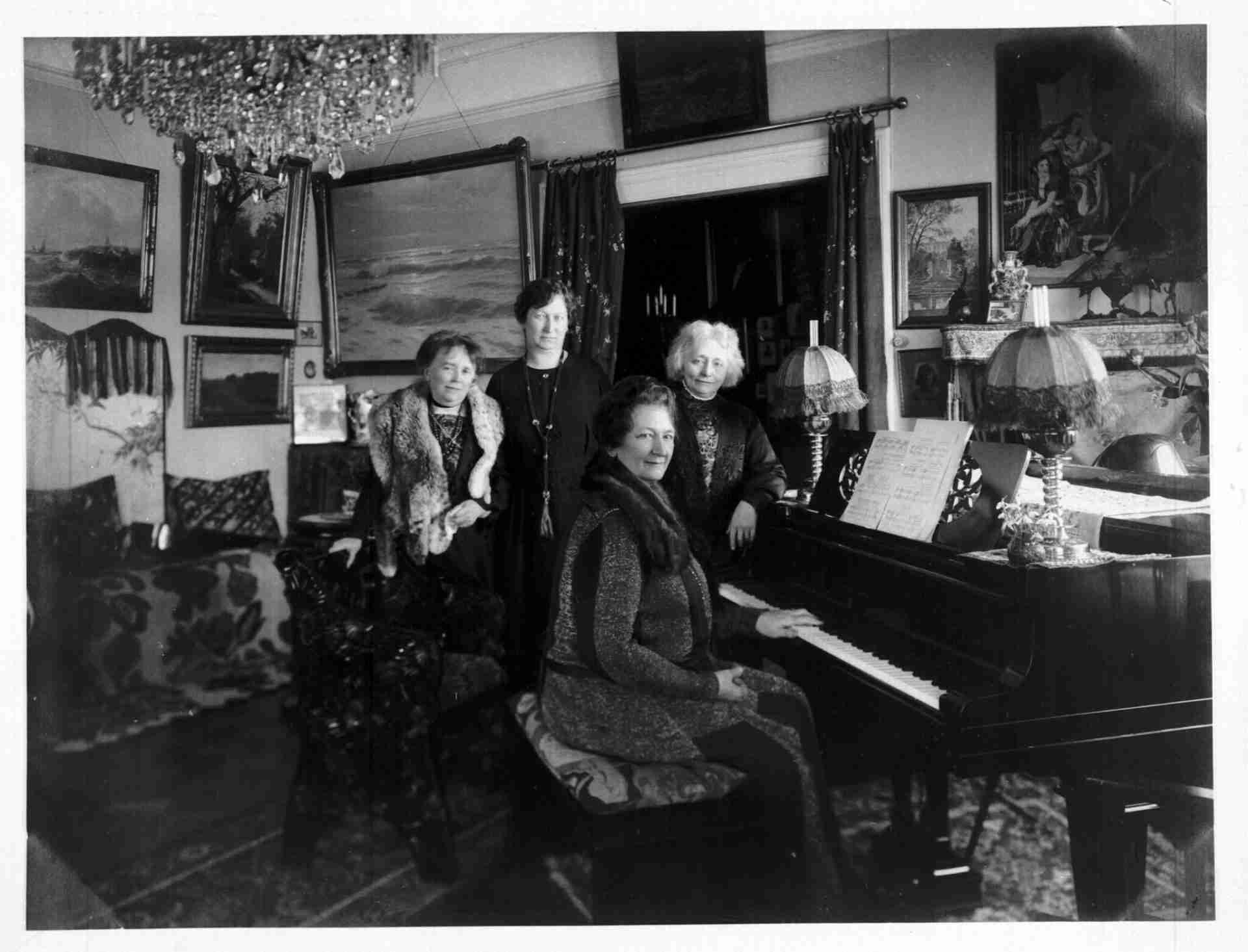 Nina Hagerup Grieg with friends by the piano. Nina Grieg with friends by the piano. Bergen Public Library Norway from Bergen, Norway, No restrictions, via Wikimedia Commons