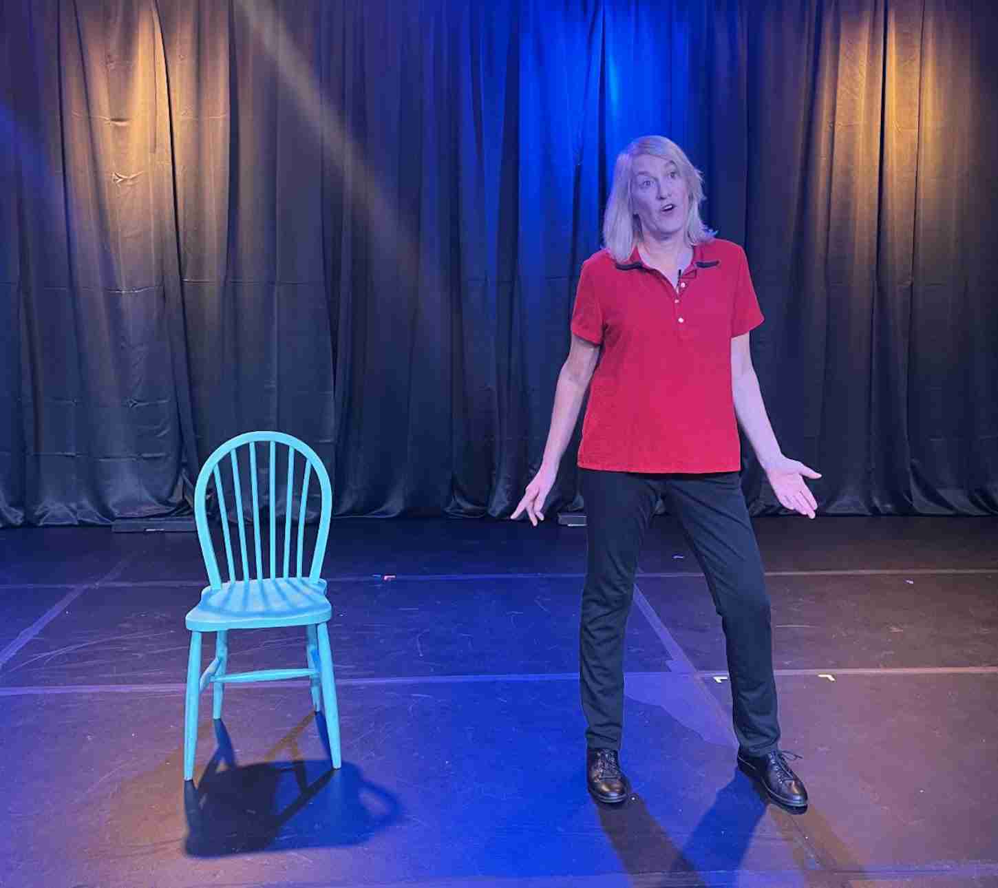 Susan Jeremy in a scene from Robert Will Show You the Door (Tales of Being Fired) at LA MAMA. Photo by Will Chichak.