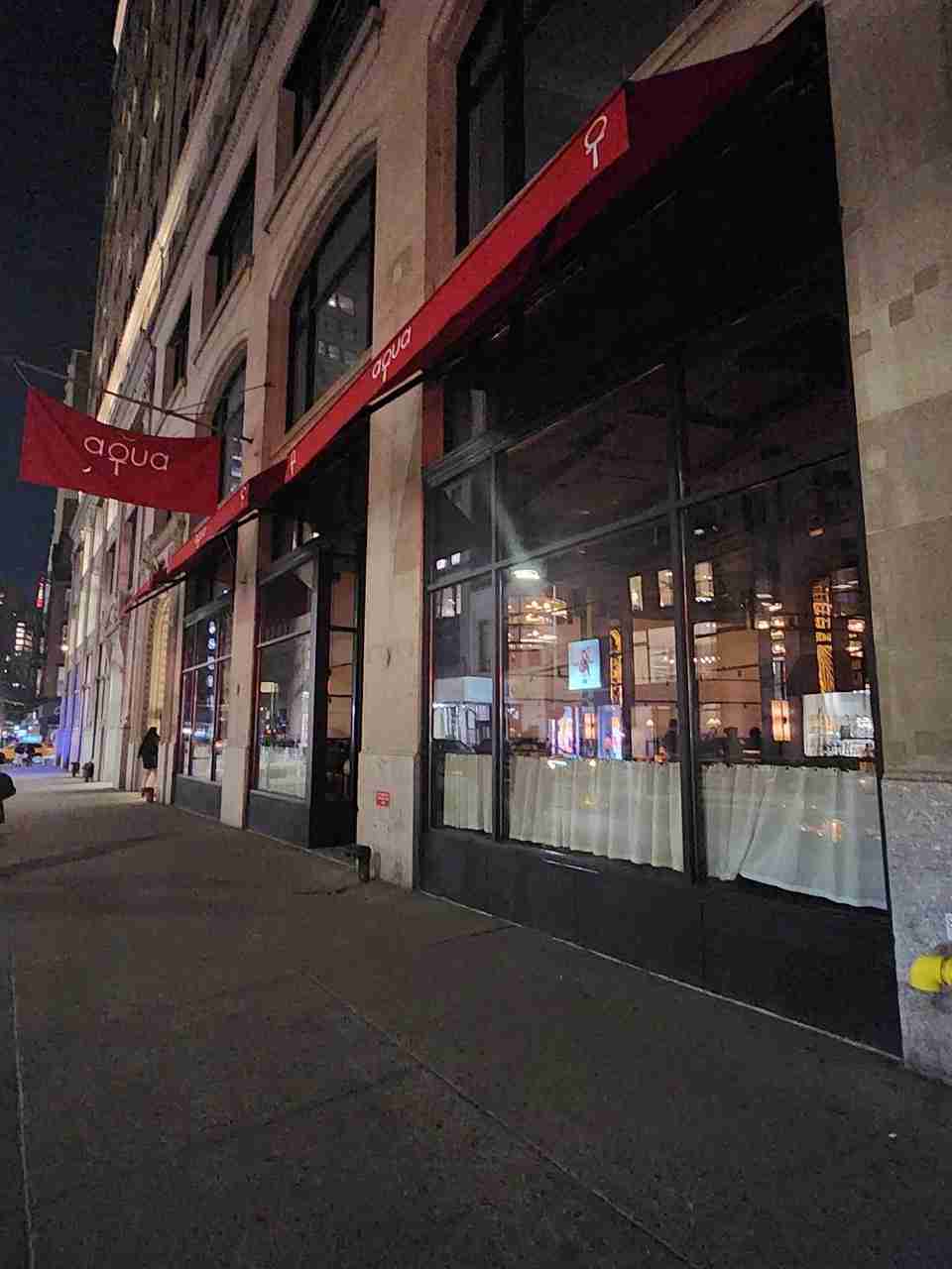 A sidewalk view of Aqua Restaurant in Manhattan's Flatiron Neighborhood. Photo by Sora Vernikoff