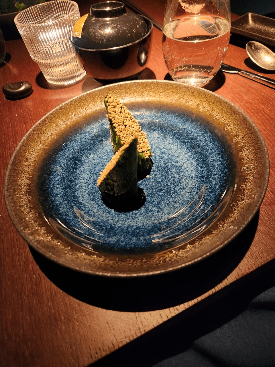 Spinach Salad and Goma dressing appetizer at Aqua Restaurant in Manhattan's Flatiron Neighborhood. Photo by Sora Vernikoff