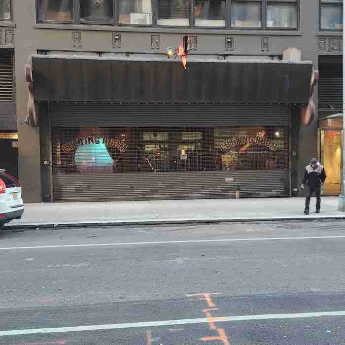 A building with a door and windows AI-generated content may be incorrect.