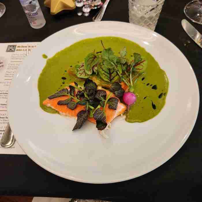 A plate of food on a table AI-generated content may be incorrect.