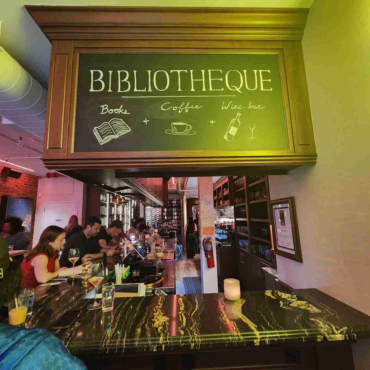 Bar Seating at Biblioteque Bookstore, Café and Wine Bar. Photo by Sora Vernikoff