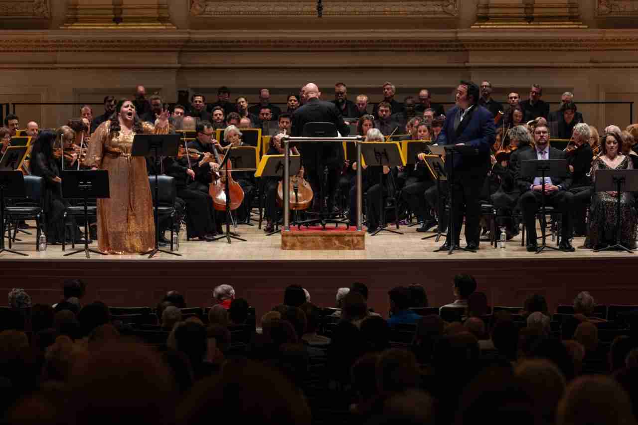 Angela Meade, Soprano as Freihild, and John Matthew Myers, Tenor, as Guntram, with conductor Leon Botstein and the ASO. Photo Credit: Matt Dine