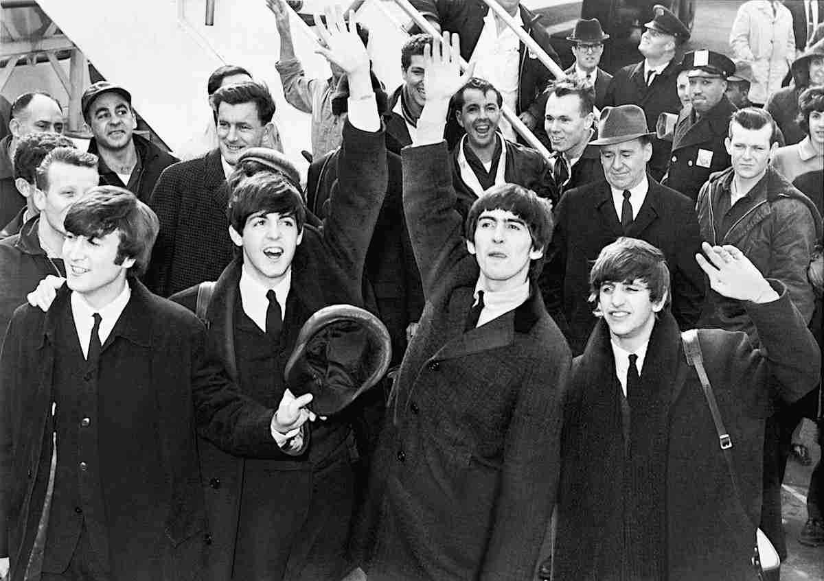 The Beatles Arrive at JFK Airport (1964) United Press International, photographer unknown, Public domain, via Wikimedia Commons