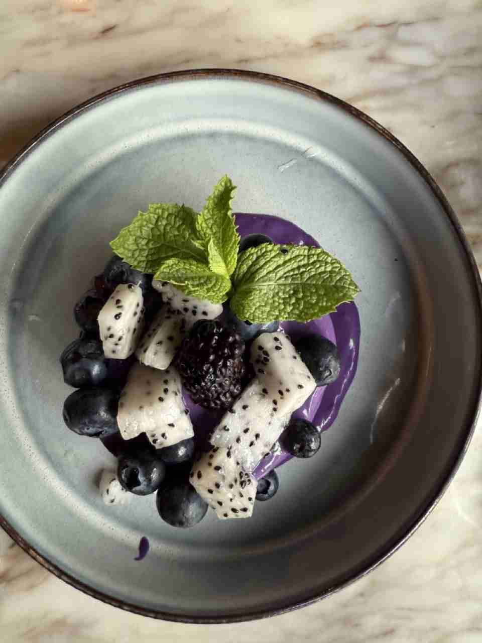 Ube Cheesecake with fruit and mint at Ginger and Lemongrass Vietnamese Fusion Restaurant. Photo by Valerie Blanchard
