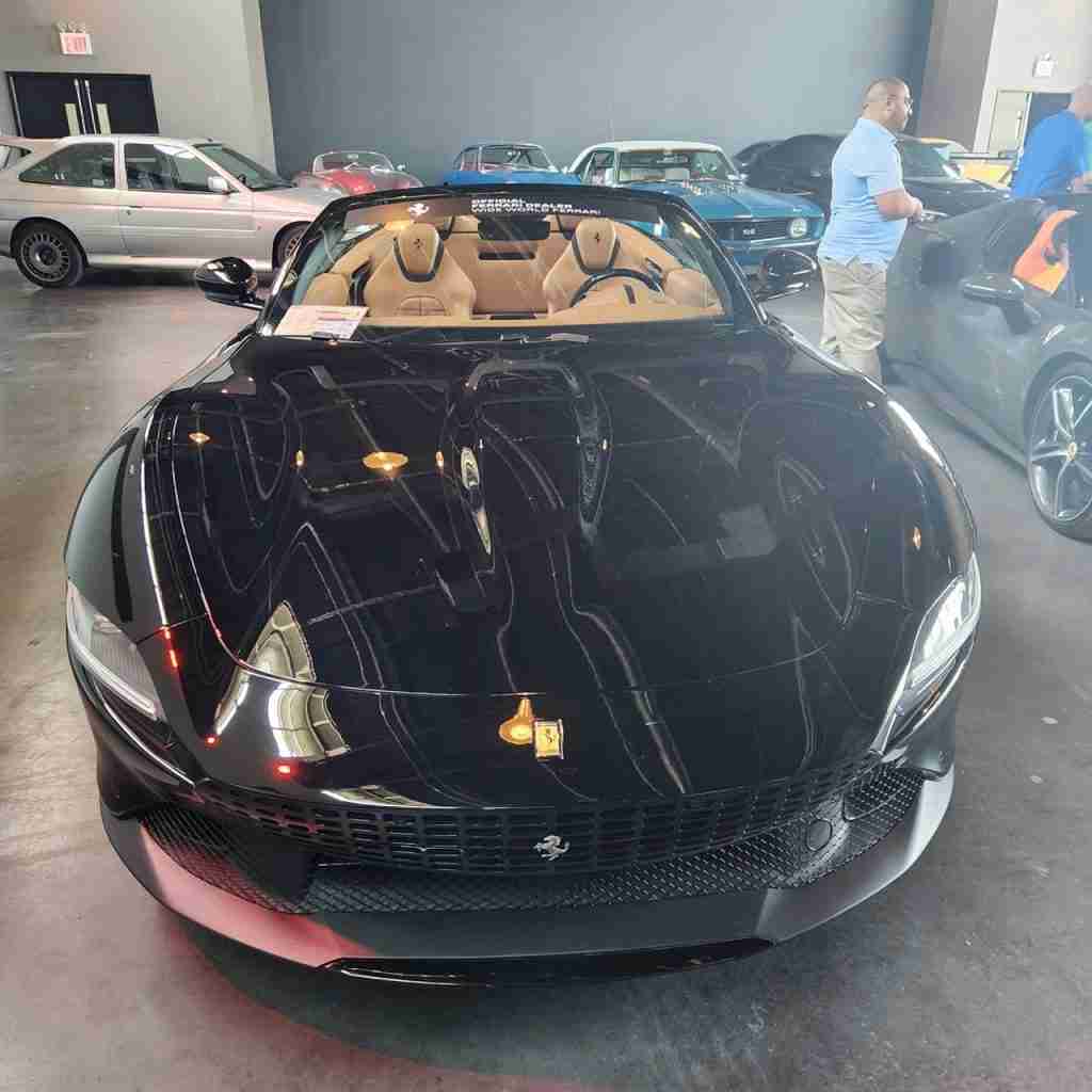 A gleaming black Ferrari at the Classic Car Club at Pier 76. Photo by Sora Vernikoff