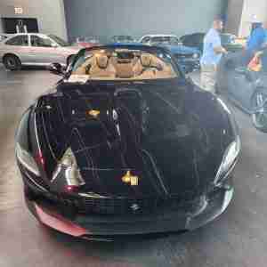 A gleaming black Ferrari at the Classic Car Club at Pier 76. Photo by Sora Vernikoff