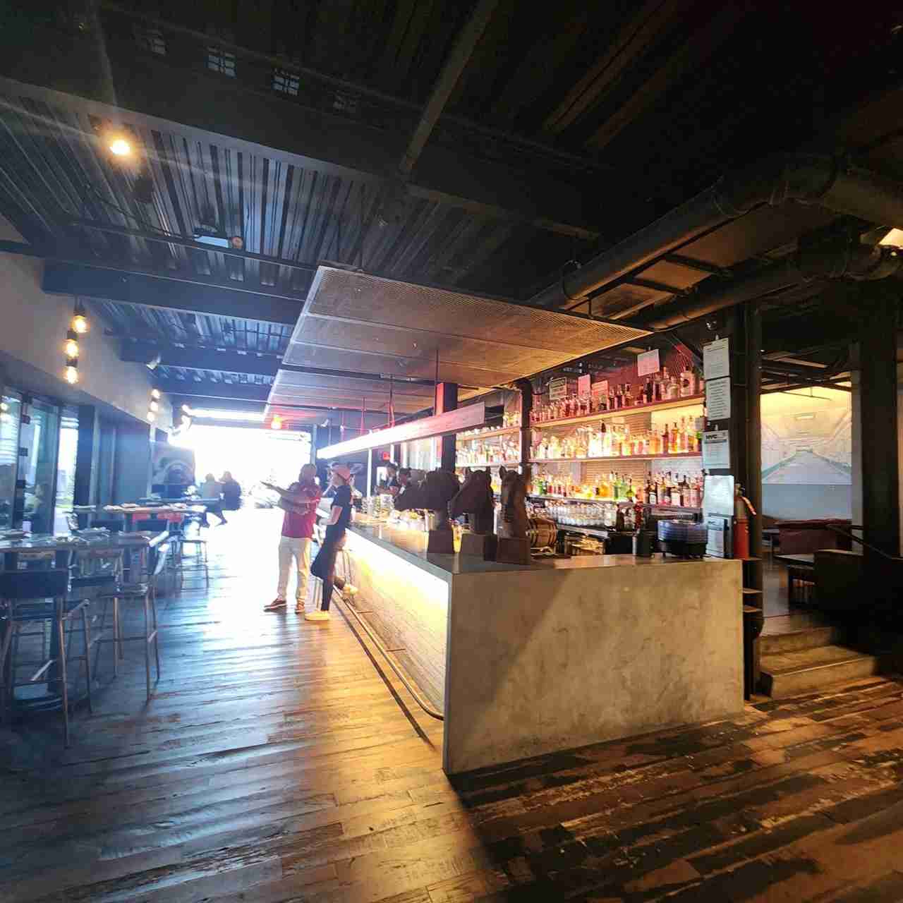 Bar and seating at the Classic Car Club at Pier 76. Photo by Sora Vernikoff
