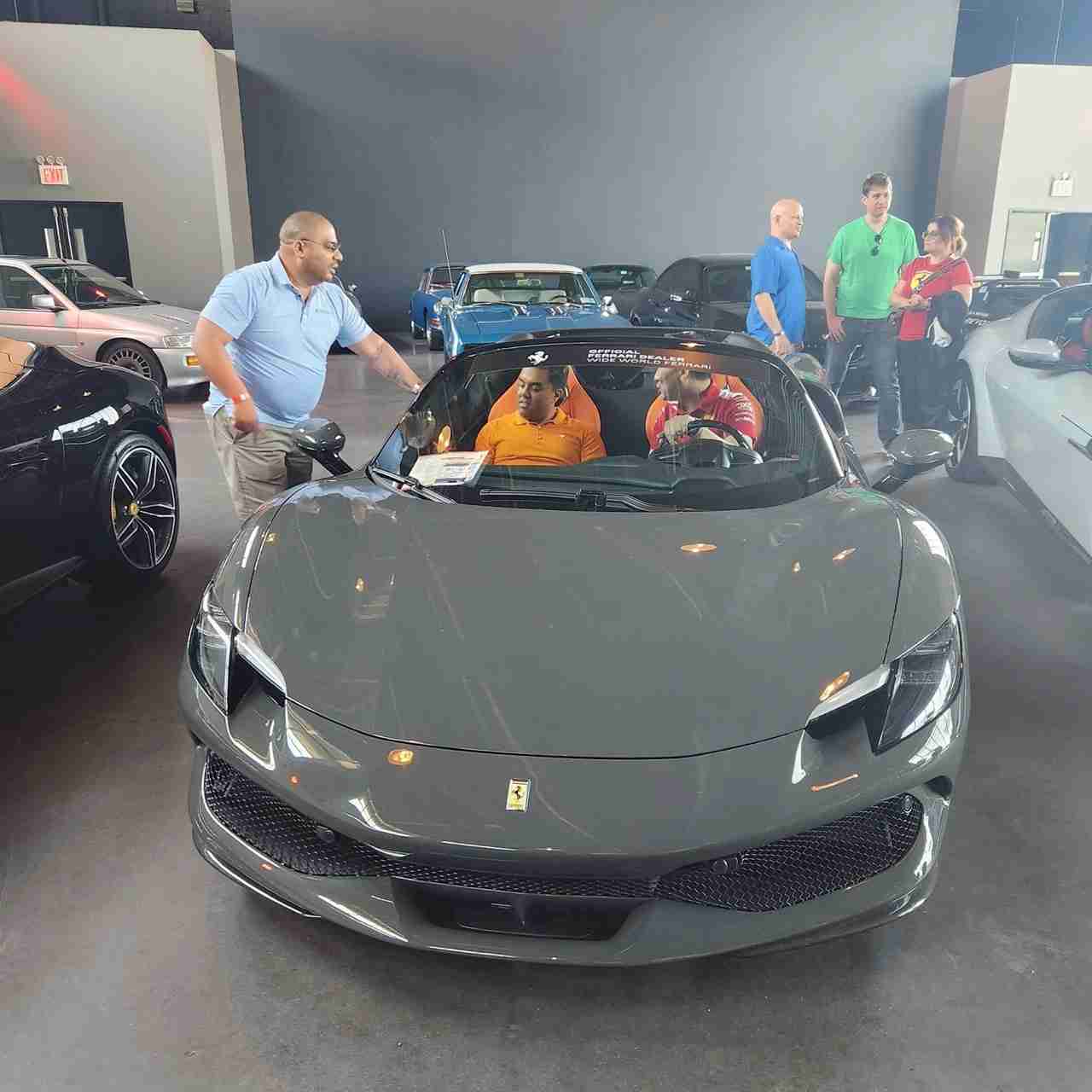 Seated in a Ferrari at the Classic Car Club at Pier 76. Photo by Sora Vernikoff