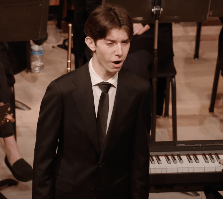 Casey Schopflocher, Countertenor, Performing with the Park Avenue Chamber Symphony, conducted by David Bernard, in the Kaufman Music Center’s 2025 Special Music High School Concerto Competition Winners' Concert at Merkin Concert Hall, New York City. Screen capture courtesy KaufmanCenter.org