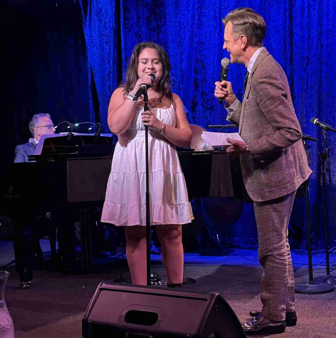 Jim Caruso welcoming Ava Nicole Francis to Center Stage at Jim Caruso's Cast Party at Birdland Jazz NYC. Photo by Edward Kliszus