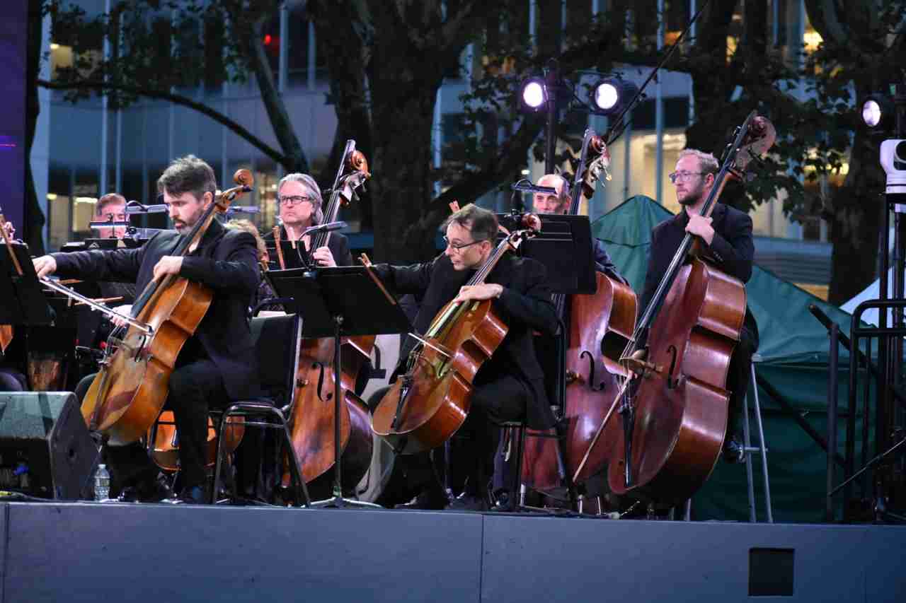 Low strings of the American Symphony Orchestra in a concert entitled New York Profiles by the American Symphony Orchestra at Bryant Park. Photo by Edward Kliszus 