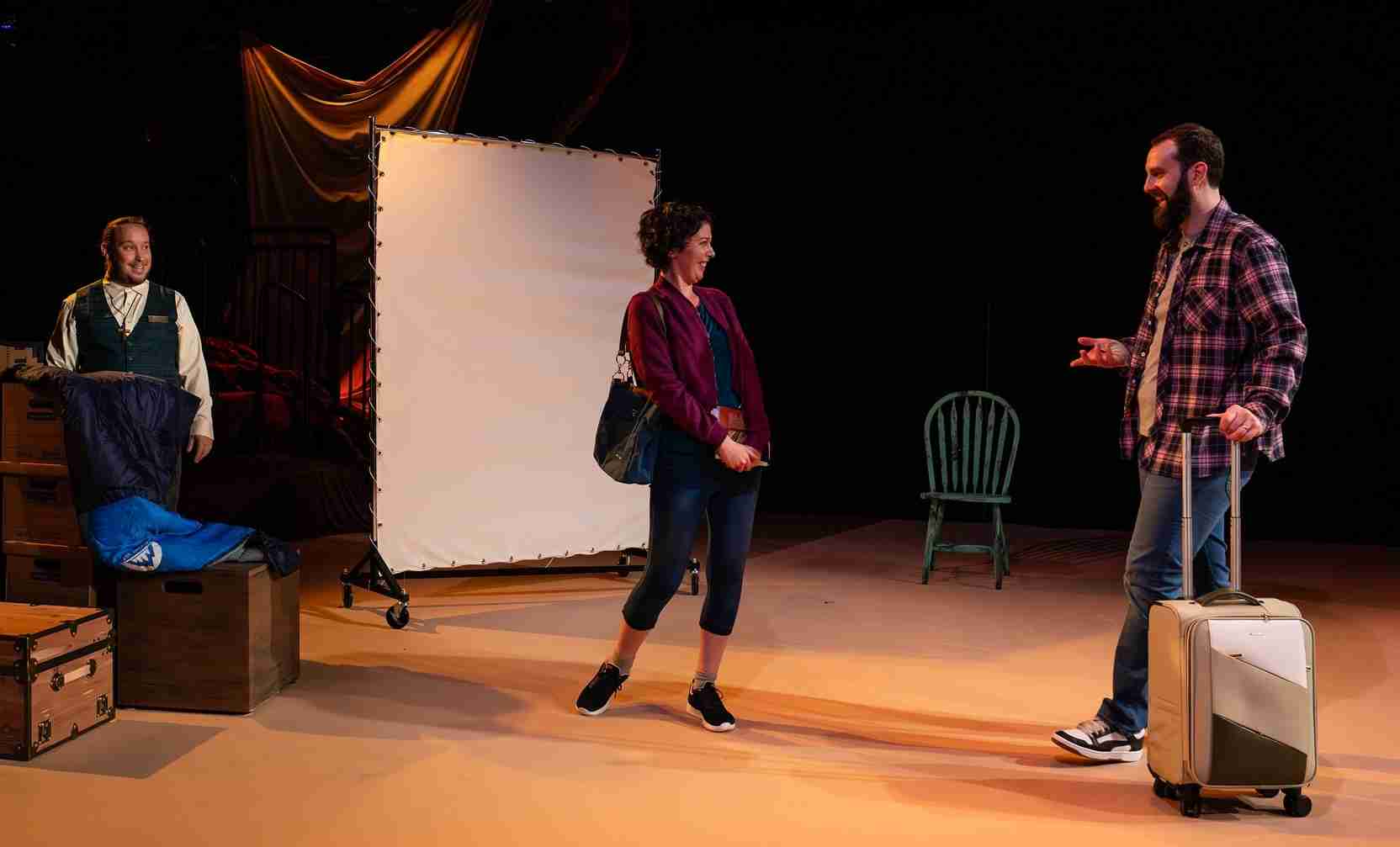Miles Purinton as The Concierge, Patricia Lynn as Millie, and Mark Weatherup Jr. as John. Photo by Al Foote III.