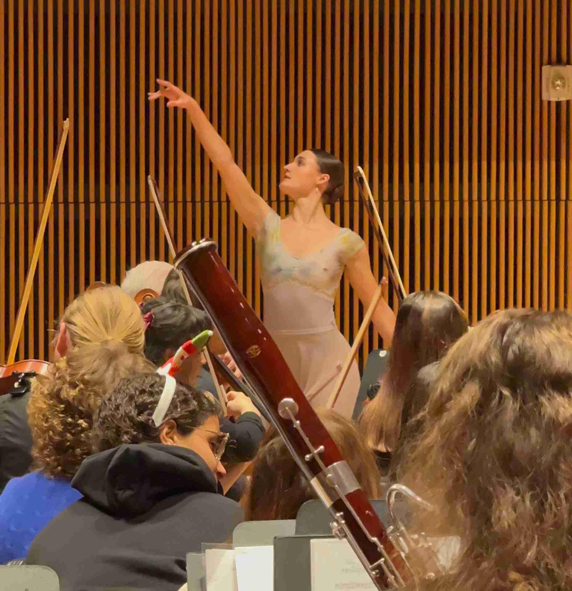 A view from the woodwind section of Ballet Dancer Savanah Quiner in a scene from InsideOut Nutcracker with David Bernard and the Park Avenue Chamber Symphony at the DiMenna Center for Classical Music in NYC. Courtesy PACS
