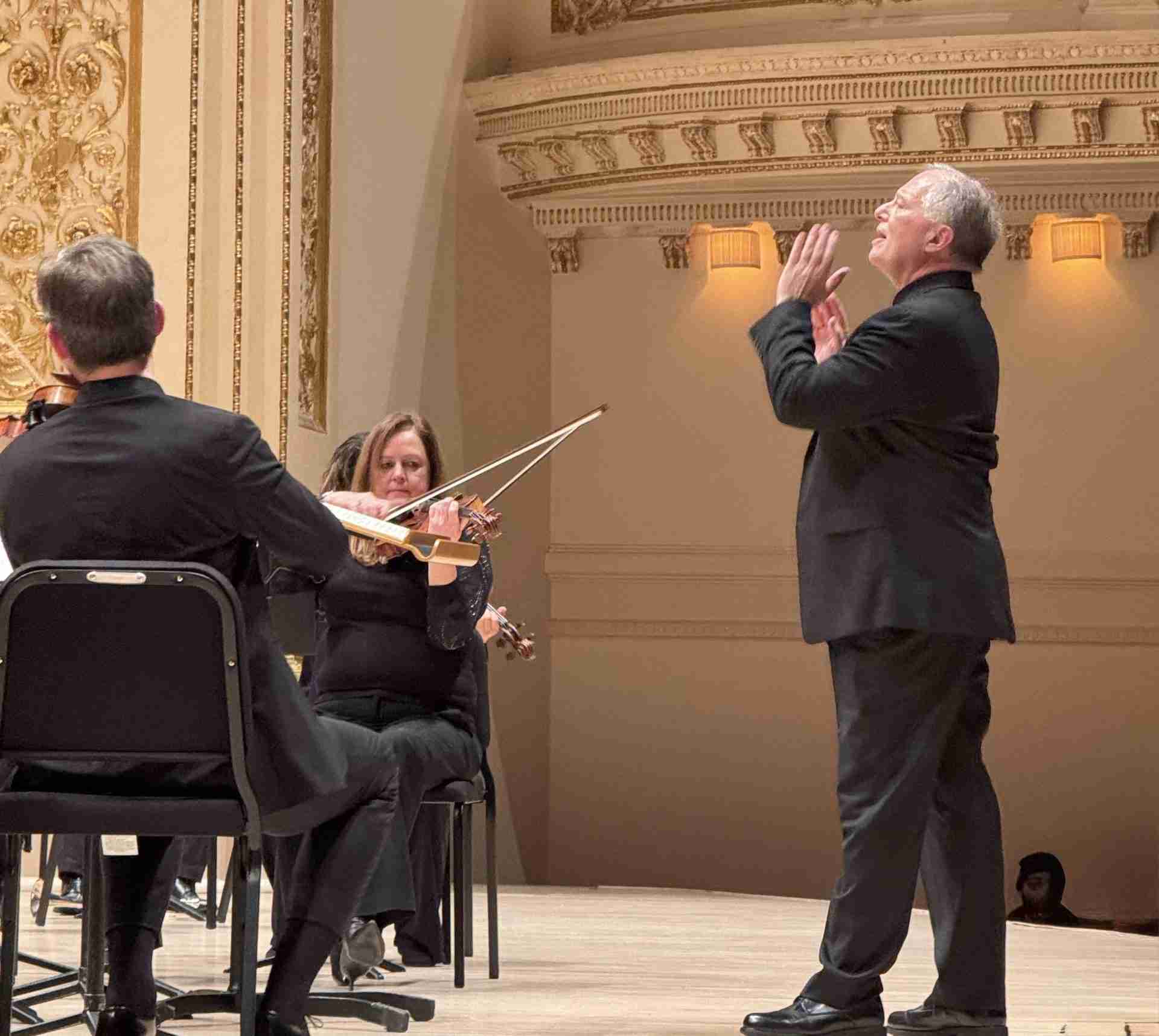 Maestro Kent Tritle conducting tonight's encore, Handel's "Hallelujah" chorus with the Chorus and Orchestra of Musica Sacra in Classics for Christmas at Carnegie Hall. Photo by Edward Kliszus
