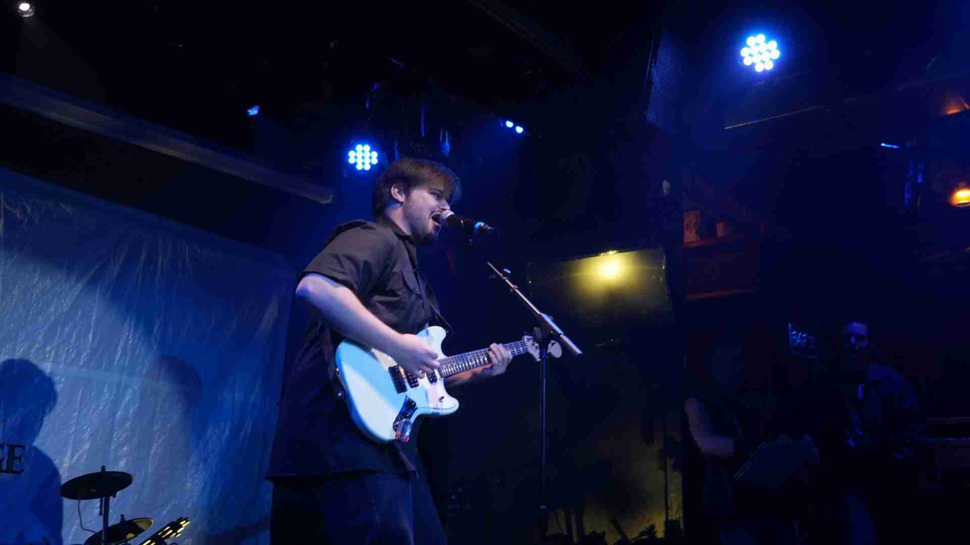 Alex Crossland in a scene from the World Premiere of the Musical "Falling Out" presented by Frigid New York at Under St. Marks in Manhattan's East Village. Photo by Seana E. Rogovin