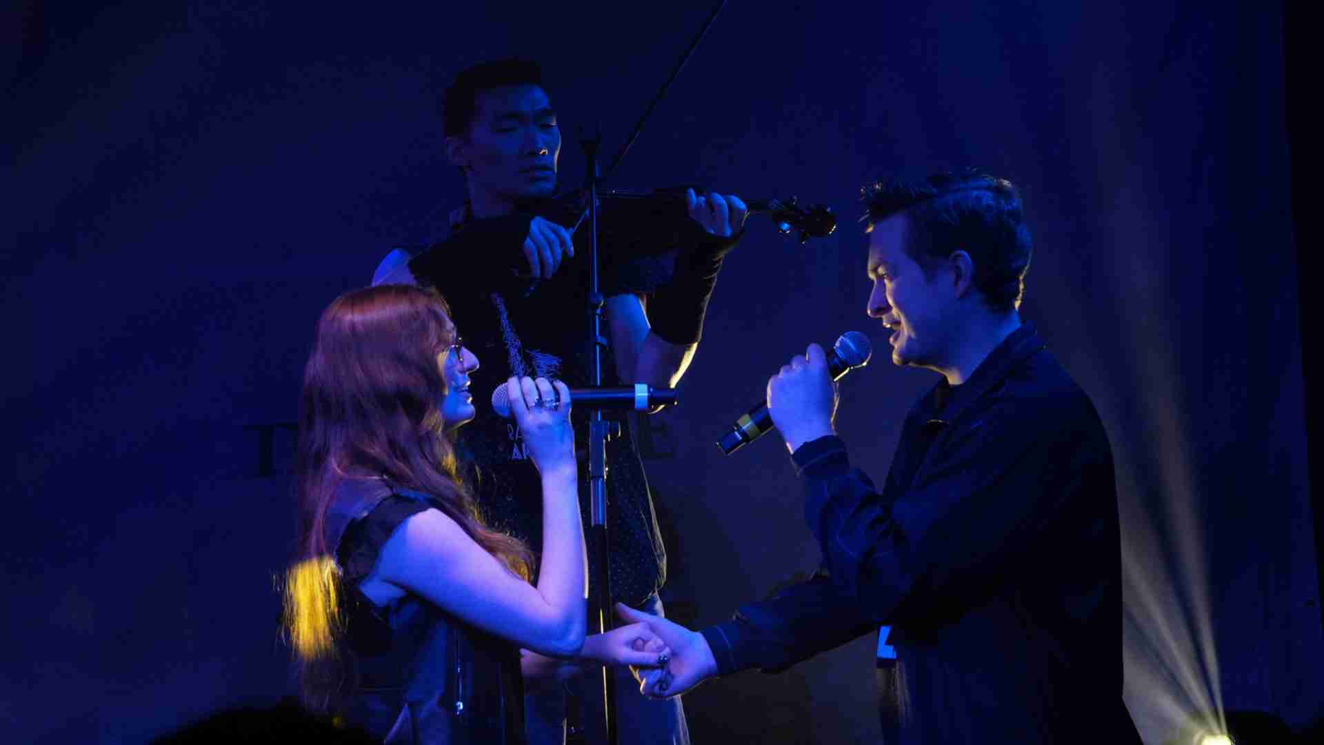 Amelia Grace Beckham, Matthew Liu, and Patrick Dinnsen in a scene from the World Premiere of the Musical "Falling Out" presented by Frigid New York at Under St. Marks in Manhattan's East Village. Photo by Seana E. Rogovin