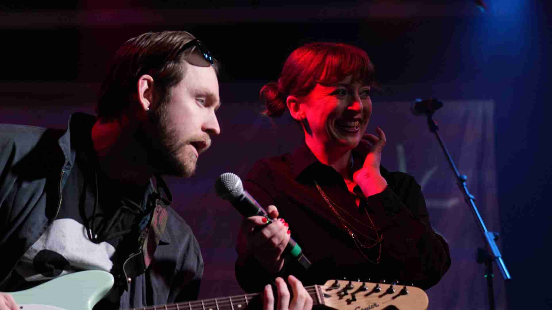 Gavin Cole and Ashley Margaret Morton in a scene from the World Premiere of the Musical "Falling Out" presented by Frigid New York at Under St. Marks in Manhattan's East Village. Photo by Seana E. Rogovin