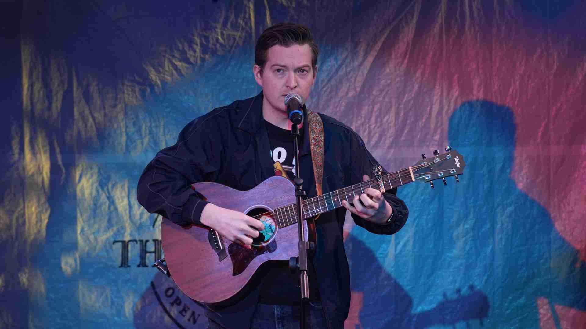 Patrick Dinnsen in a scene from the World Premiere of the Musical "Falling Out" presented by Frigid New York at Under St. Marks in Manhattan's East Village. Photo by Seana E. Rogovin