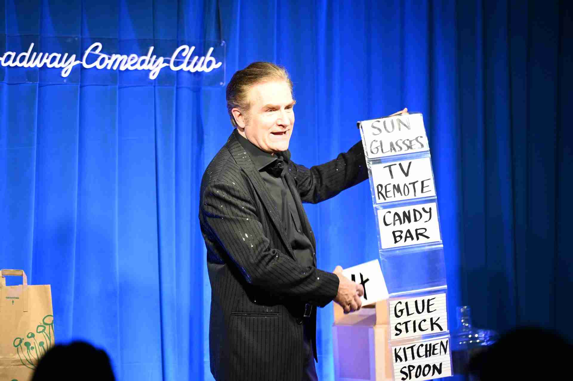 Jim Vines performing in a scene from The Broadway Magic Hour at the Broadway Comedy Club in New York City. Courtesy Michelle Tabnick PR