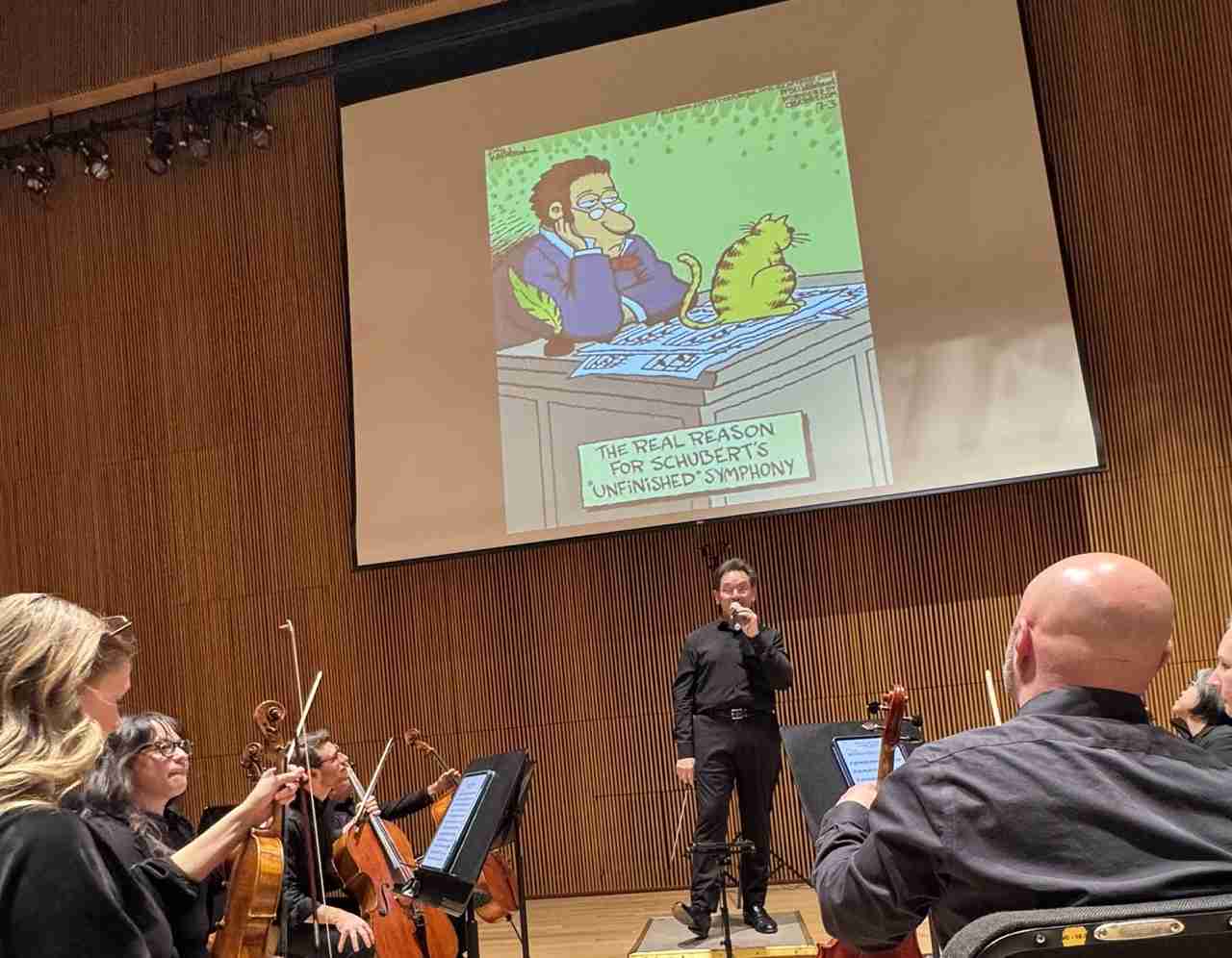Maestro David Bernard describing Franz Schubert's Symphonic Works in a concert entitled "Sublime Schubert' with the Park Avenue Chamber Symphony at the DiMenna Center for Classical Music. Photo Courtesy PACS